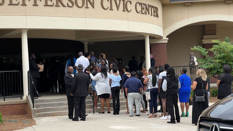 Mourners gather for the funeral of 72-year-old Calvin Varnum at the Jefferson Civic Center on Wednesday.
