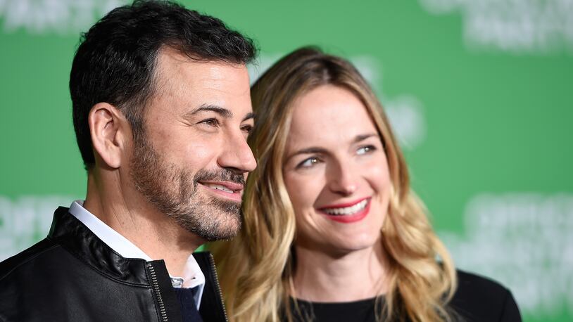 Jimmy Kimmel (L) and his wife, screenwriter Molly McNearney attend the premiere of Paramount Pictures' "Office Christmas Party" at Regency Village Theatre on December 7, 2016 in Westwood, California.  (Photo by Matt Winkelmeyer/Getty Images)