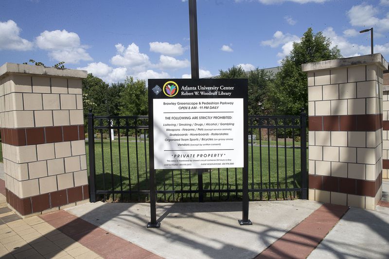 08/21/2019 -- Atlanta, Georgia -- An informative sign with a list of restrictions, including guns, is posted outside of the promenade near the Robert W. Woodruff library on the main campus of Clark Atlanta University in Atlanta, Wednesday, August 21, 2019. (Alyssa Pointer/alyssa.pointer@ajc.com)