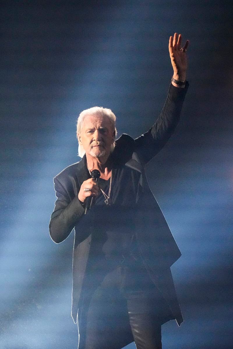 Johnny Logan of Ireland, two-time Eurovision winner, performs the song Euphoria during the first semi-final at the Eurovision Song Contest in Malmo, Sweden, Tuesday, May 7, 2024. (AP Photo/Martin Meissner)
