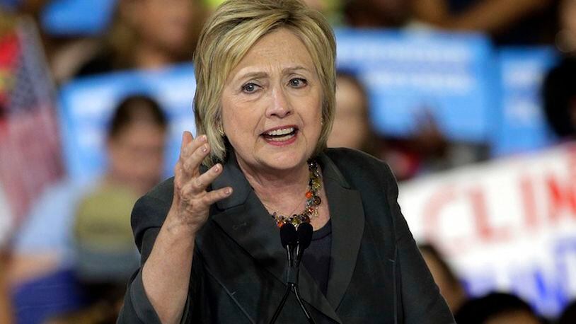 Democratic presidential candidate Hillary Clinton gestures as she speaks during a rally in Raleigh, N.C., Wednesday, June 22, 2016. (AP Photo/Chuck Burton)