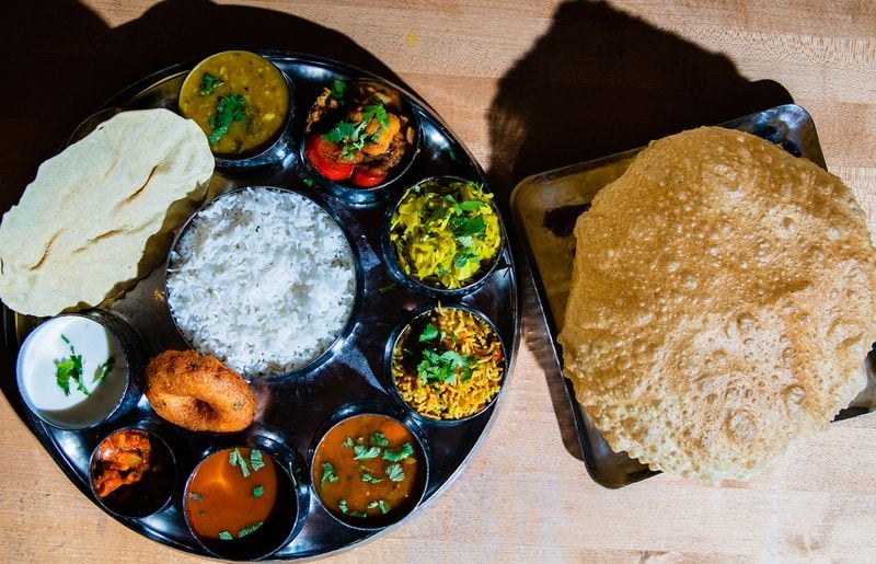 Madras Mantra, 2179 Lawrenceville Highway, Decatur.  “I’d say stick with the flavors as the kitchen suggests them. Order the chole bhatura and you’ll be delivered a large platter bearing two deep-fried bhaturas as fluffy and inflated with air as a pair of balloons. “ – Wyatt Williams