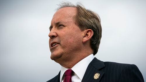 FILE -- Ken Paxton, the Texas attorney general, holds a news conference outside the Supreme Court building in Washington, Sept. 9, 2019. An architect of Texas Republicans’ aggressive conservative agenda, Paxton now stands accused of wrongdoing by his own aides and faces calls for his resignation.  (Al Drago/The New York Times) .