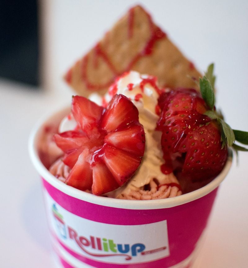 Roll It Up makes rolled ice cream, like this strawberry and graham cracker combination. CONTRIBUTED BY HENRI HOLLIS