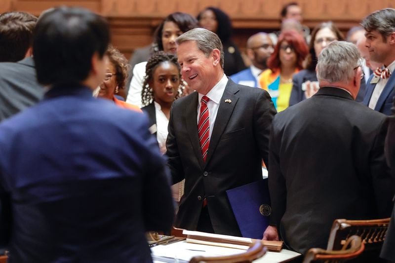 Gov. Brian Kemp greets legislators as he enters the House chambers on Sine Die, the last day of the General Assembly at the Georgia State Capitol in Atlanta on on Wednesday, March 29, 2023. (Natrice Miller/ natrice.miller@ajc.com)