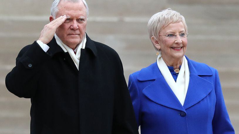 Jan. 14, 2019 Atlanta: Governor Nathan Deal salutes the troops as he and First Lady Sandra Deal depart the Georgia State Capitol during a ceremonial send-off after Governor Brian Kemp was sworn-in on inauguration day on Monday, Jan. 14, 2019, in Atlanta.  (Curtis Compton/ccompton@ajc.com)