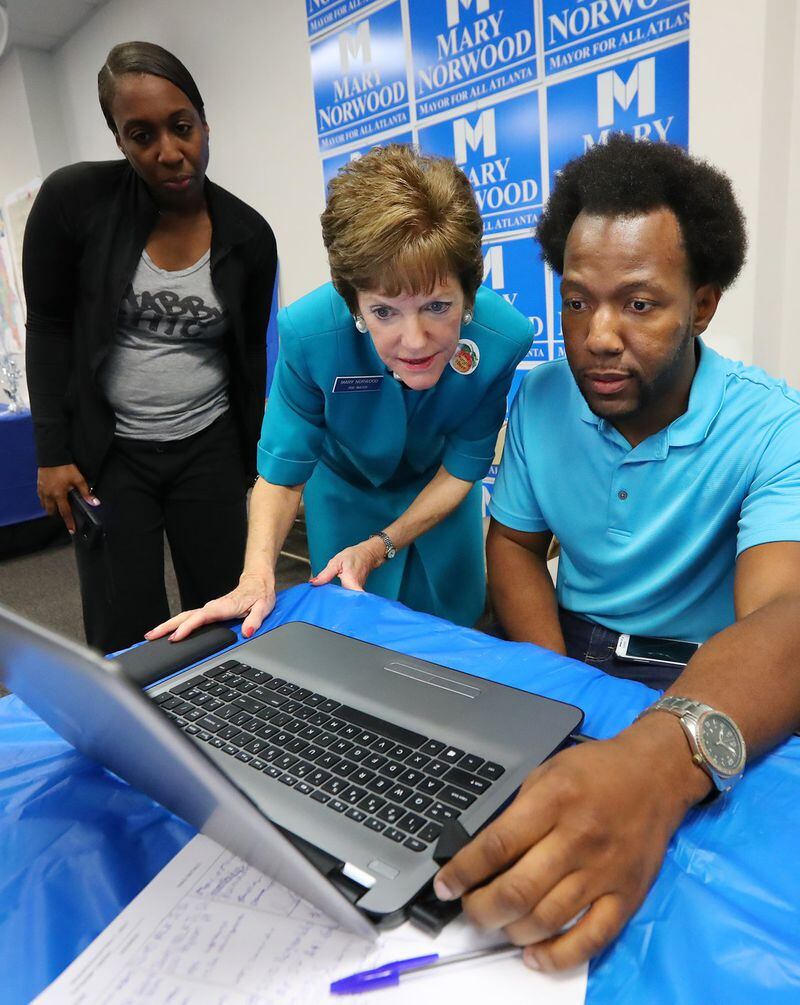 November 7, 2017: Mary Norwood, candidate for mayor, looks for early returns with field director Sebastian Barron at her headquarters on Martin Luther King, Jr. Drive after the polls close on Tuesday, November 7, 2017, in Atlanta. Curtis Compton/ccompton@ajc.com