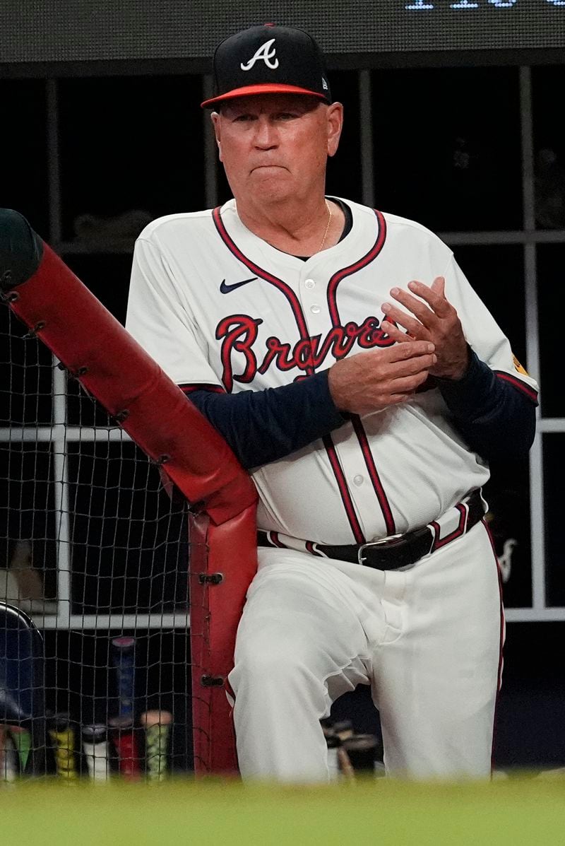Atlanta Braves manager Brian Snitker (43) looks on from the dugout during a baseball game against the Boston Red Sox Tuesday, May 7, 2024, in Atlanta. (AP Photo/John Bazemore)