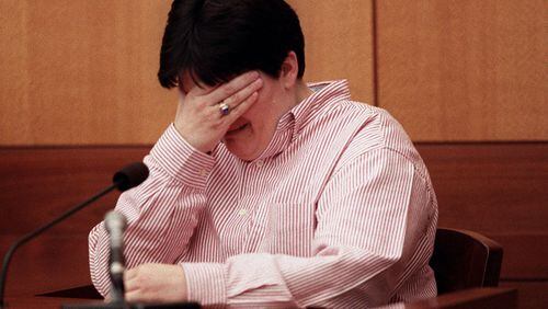 Alanta Police Officer Pat Cocciolone breaks down as she testifies in February 2000 about Gregory Lawler shooting her and killing fellow officer Rick Sowa. (Kimberly Smith/AJC file photo)