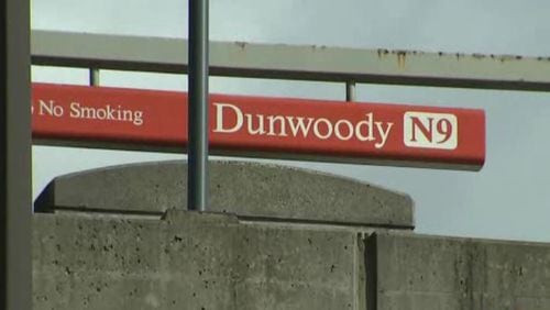 A suspect in a robbery and carjacking was arrested at the Dunwoody MARTA station.