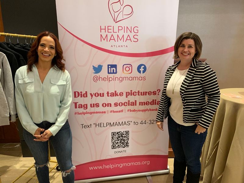 At the Omni Hotel on Thursday, December 15, 2022, Elle Duncan supports Helping Mamas, which raises money to provide diapers for women in need. She is here with Stephanie Ungashick, Helping Mamas Director of Advancement. RODNEY HO/rho@ajc.com