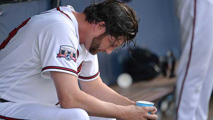 Braves reliever Jason Grilli reacts in dugout during Monday's season-opening loss to the Washington Nationals. Hyosub Shin/hshin@ajc.com