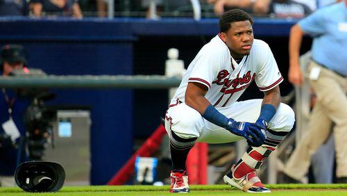 ATLANTA, GA - AUGUST 15: Ronald Acuna Jr. #13 of the Atlanta Braves reacts to being hit by the first pitch of the game against the Miami Marlins at SunTrust Park on August 15, 2018 in Atlanta, Georgia. (Photo by Daniel Shirey/Getty Images)