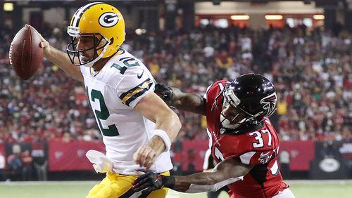 In his last visit to Atlanta, the Packers' Aaron Rodgers complete 28 passes for 246 yards and no interceptions. He ran six times for 60 yards and a late score.