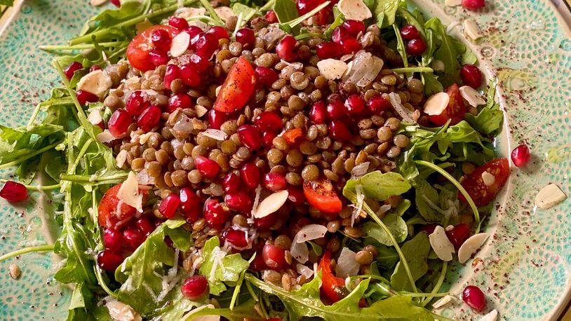 Brand’s Arugula with warm lentils and pomegranate is the perfect healthy meal for fall or winter. 
Courtesy of Paulina Brand