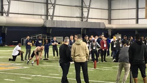 Georgia Tech's Nathan Cottrell runs the 3-cone drill at the team's annual pro day March 11, 2020. (AJC photo by Ken Sugiura)