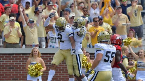 Georgia Tech wide receiver Ricky Jeune (2) and Tech quarterback TaQuon Marshall (16) celebrate after Tech wide receiver Ricky Jeune (2) caught a touchdown pass in the first half of the Tech home opener at Bobby Dodd Stadium on Saturday, September 9, 2017.  HYOSUB SHIN / HSHIN@AJC.COM