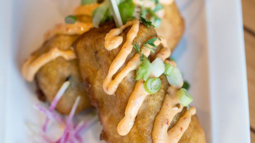 Hopstix Sushi Corndog with beer-battered fried spicy tuna roll, and spicy mayo. Photo credit- Mia Yakel.