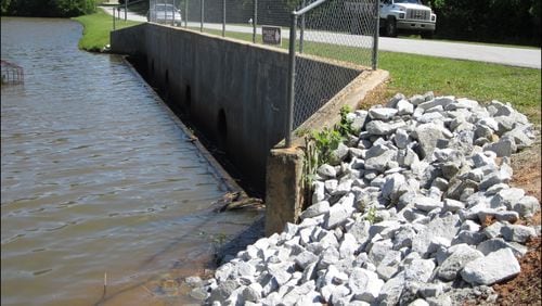 The deteriorating dam that runs under Emerald Lake Drive in Fayette County will soon be replaced. Courtesy Fayette County