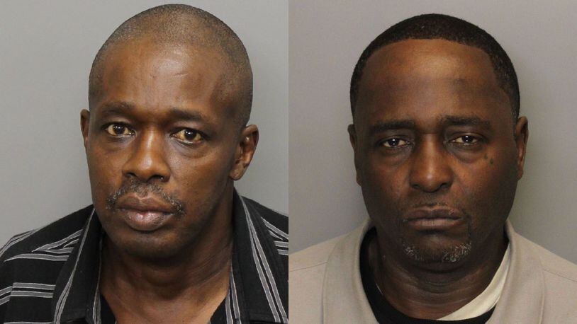 Previous Cobb County Jail booking photos of Keith Kenneth Stone, left, and Darryl Wayne Tolbert.