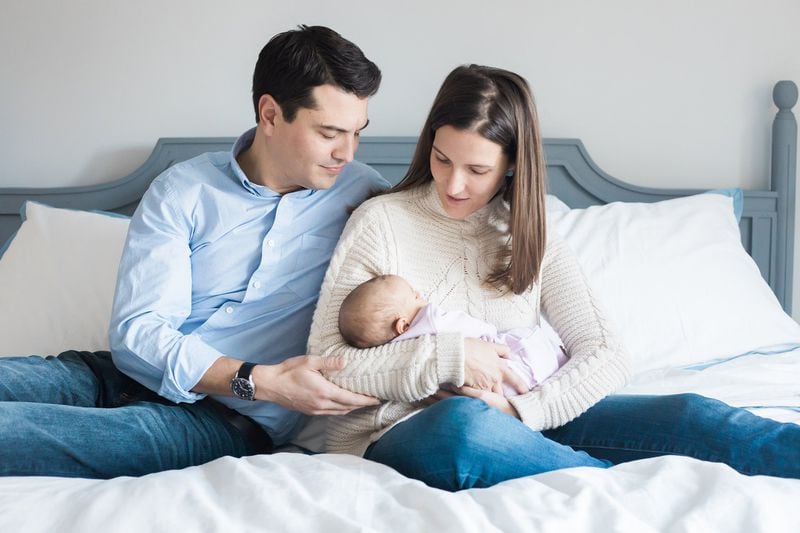 Christian Broder with his wife, Molly, and infant daughter. The 34-year-old D.C. area restaurant general manager was fatally shot in 2018 outside a wedding reception at Capital City Country Club in Atlanta. (Claire Harvey Photography)