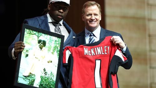 Takkarist McKinley of UCLA poses with NFL commissioner Roger Goodell after being picked #26 overall by the Falcons during the first round of the 2017 NFL Draft at the Philadelphia Museum of Art on April 27.