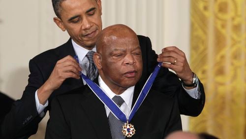 President Barack Obama said of John  Lewis: “He loved this country so much that he risked his life and its blood so that it might live up to its promise."  (AP Photo/Carolyn Kaster, File)