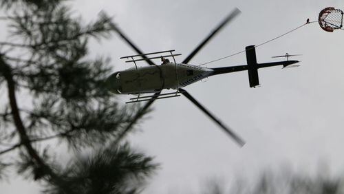 A helicopter helps with rescue efforts at Tallulah Gorge in northeast Georgia.