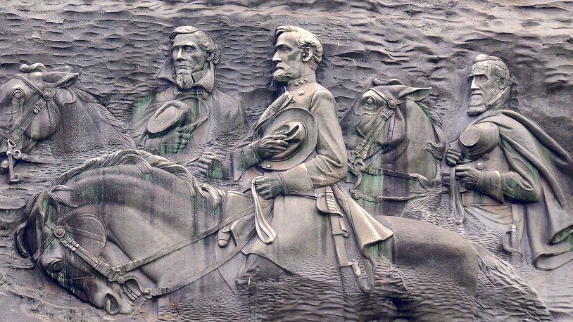 The images carved onto Georgia’s Stone Mountain, including Confederate President Jefferson Davis. Gen. Robert E. Lee and Gen. Stonewall Jackson.