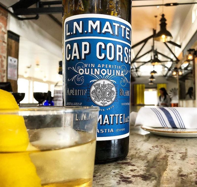 At Scout in Oakhurst, the Mattei Cap Corse Blanc comes simply adorned with lemon peel. Photo: Brad Kaplan