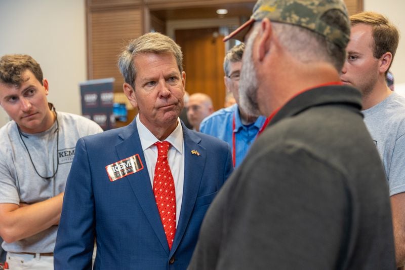 At the state GOP's convention in 2021, Gov. Brian Kemp faced boos from delegates over his refusal to illegally overturn the results of the 2020 presidential race in Georgia, as Donald Trump had demanded. Nathan Posner for the Atlanta-Journal-Constitution