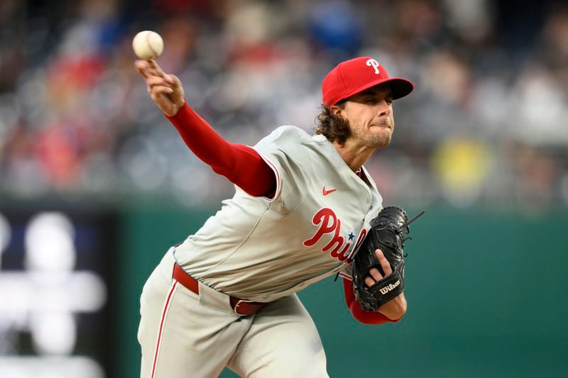 Philadelphia Phillies pitcher Aaron Nola throws during the first inning of a baseball game against the Washington Nationals, Friday, April 5, 2024, in Washington. (AP Photo/Nick Wass)