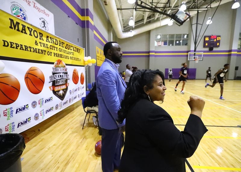 050422 Atlanta: Council Member Andrea Boone and Parks and Recreation Director Ramondo Davidson watch the competition during Atlanta Mayor Andre Dickens’ Midnight Basketball League that serves as an anti-crime initiative at the C.T. Martin Recreation Center on Wednesday, May 4, 2022, in Atlanta.    “Curtis Compton / Curtis.Compton@ajc.com”