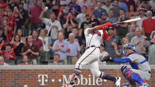 The Braves’ Ronald Acuna hits a grand slam  in the second inning of Game 3 of the National League Division Series against the Dodgers.