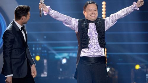 HOLLYWOOD, CALIFORNIA - APRIL 07:  Host Ryan Seacrest (L) and singer William Hung speak onstage during FOX's "American Idol" Finale For The Farewell Season at Dolby Theatre on April 7, 2016 in Hollywood, California. at Dolby Theatre on April 7, 2016 in Hollywood, California.  (Photo by Kevork Djansezian/Getty Images)