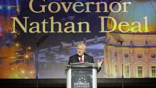 Gov. Nathan Deal addresses the Georgia Chamber’s Eggs & Issues breakfast on Wednesday. He’s called for a “clean” adoption bill. A Senate committee passed out one that contains language he vetoed last year. BOB ANDRES /BANDRES@AJC.COM