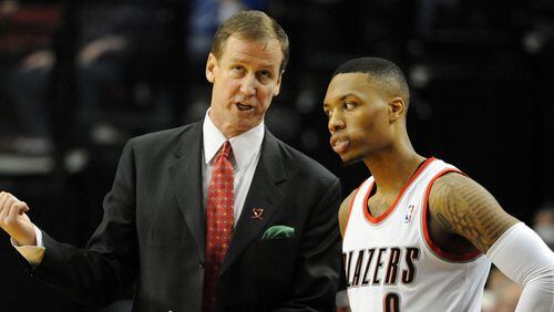 Terry Stotts, left (with guard Damian Lillard), previously held head coaching jobs with the Hawks and Milwaukee, and was fired from both of them. He's now making the most of his opportunity with Portland.