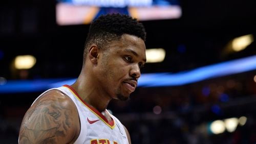 Atlanta Hawks guard Kent Bazemore walks off the court after an NBA basketball game against the Memphis Grizzlies Friday, Dec. 15, 2017, in Memphis, Tenn. The Grizzlies defeated the Hawks 96-94. (AP Photo/Brandon Dill)