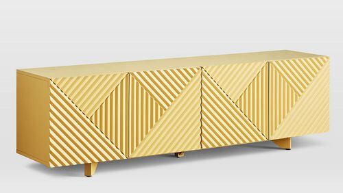 Soft yellow pairs with a graphic pattern for a trend twofer in the West Elm Rosanna Ceravolo Media Console ($1,299). (West Elm)