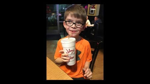 A fundraiser held at Johnny’s Pizza in Villa Rica raised more than $4,000 toward a service dog for Brody Roberts, a 7-year-old boy with autism. (Family photo)