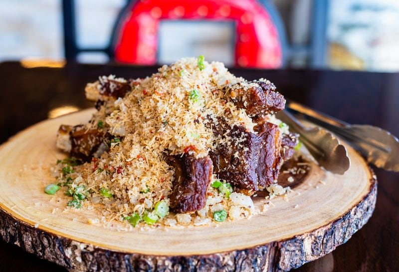 The Jingfen Crispy Pork Ribs at Fire Stone Chinese have a top-secret garnish, but our reviewer has a guess. CONTRIBUTED BY HENRI HOLLIS