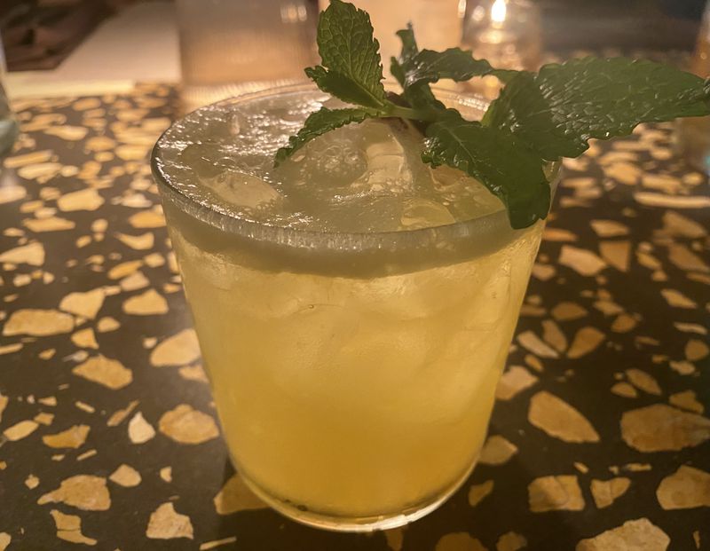 The fruity, frothy, tequila-based Tulum Tomorrow is a delicious cocktail served at Carmel. Ligaya Figueras/ligaya.figueras@ajc.com