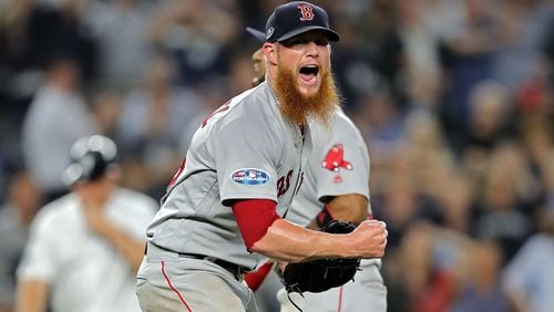 Craig Kimbrel of the Boston Red Sox celebrates after beating the New York Yankees to win Game 4 of the American League Division Series at Yankee Stadium on October 09, 2018. (Photo by Elsa/Getty Images)
