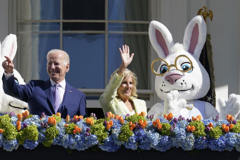 U.S. President Joe Biden and first lady Jill Biden wave to guests at the White House Easter Egg Roll in 2023.