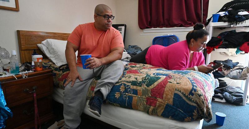 Tony and Maria Fernandez both work, but they've been stuck in a motel for years. They hope for a move to an apartment in April -- with help from a pilot program.