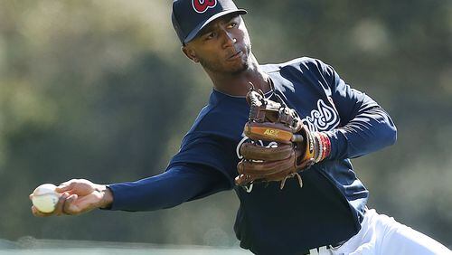 Braves second-base prospect Ozzie Albies, pictured here during a workout at 2016 spring training, is a little behind other players this spring as he recovers from September surgery for a broken elbow. (Curtis Compton / ccompton@ajc.com)