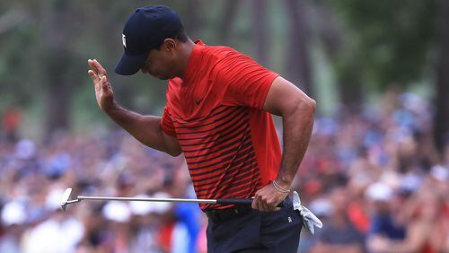 Tiger Woods reacts after missing a birdie putt on the 18th hole during the final round of the Valspar Championship at Innisbrook Resort Copperhead Course on March 11, 2018 in Palm Harbor, Florida.  (Photo by Sam Greenwood/Getty Images)
