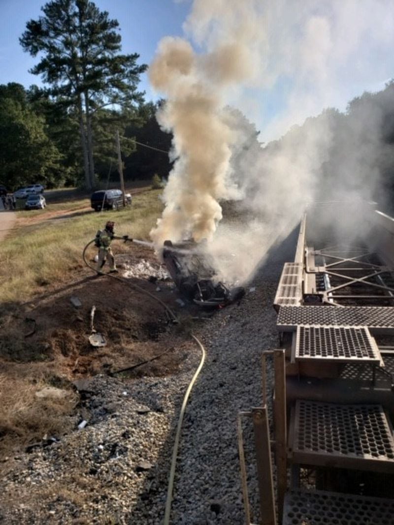 The car was engulfed in flames when firefighters arrived, Coweta County Fire Rescue said. (Photo: Coweta County Fire Rescue)