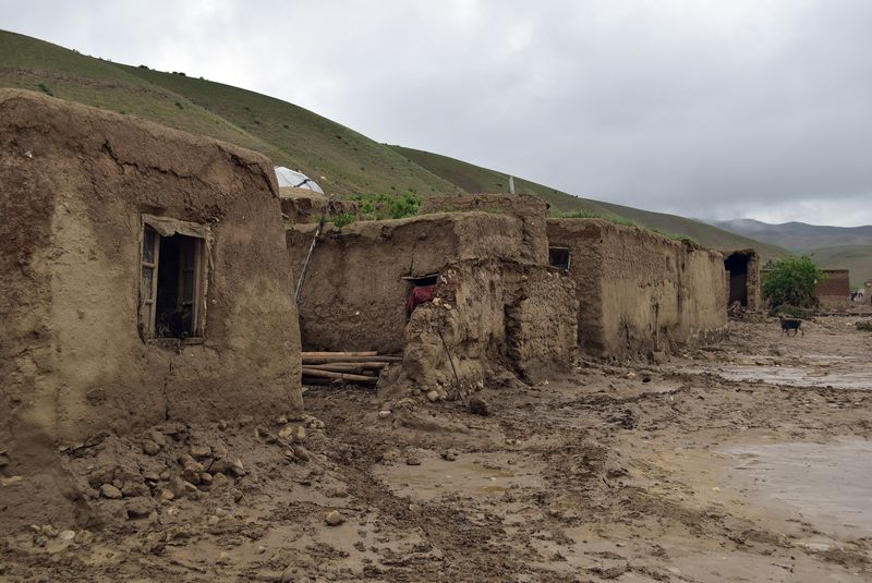 Damaged houses are seen after heavy flooding in Baghlan province in northern Afghanistan Saturday, May 11, 2024. Flash floods from seasonal rains in Baghlan province in northern Afghanistan killed dozens of people on Friday, a Taliban official said. (AP Photo/Mehrab Ibrahimi)