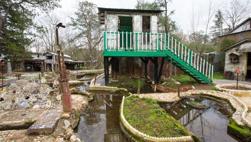 Howard Finster’s Paradise Garden has multiple structures including the Mirror House on stilts. The property is naturally wet and Finster devised a water flow system to collect and control water in the garden. Photo: Jenni Girtman/ Atlanta Event Photography)
